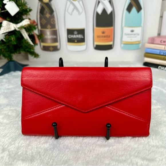 Cartier Handbags - Cartier Red Leather long wallet bifold